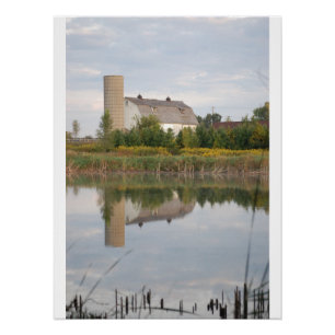 A Beautiful Barn reflecting in the Pond Poster