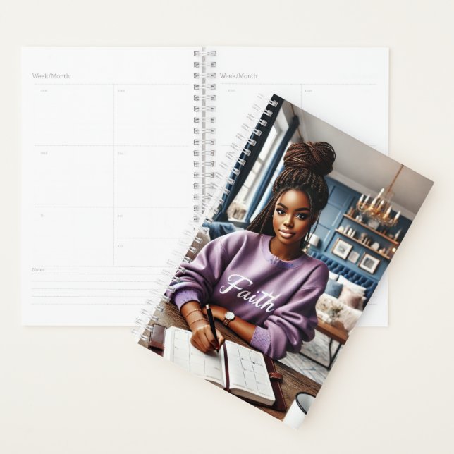 a beautiful brown-skinned girl sitting at a desk planner (Display)
