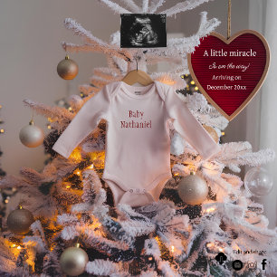 a beautiful Christmas tree pregnancy announcement 
