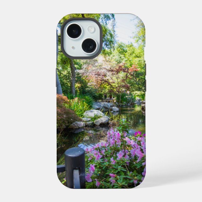 a beautiful spring landscape in the garden iPhone 15 case (Back)