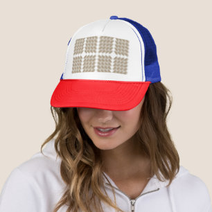 a beige and white chequered pattern on a white trucker hat