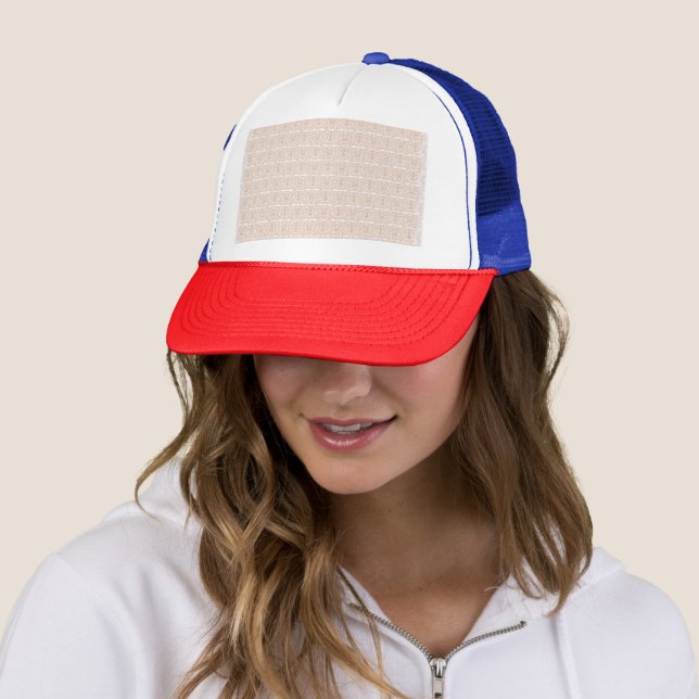 a beige and white wallpaper with a pattern trucker hat (In Situ)