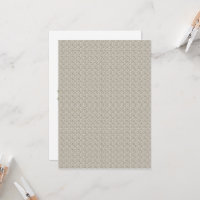 a beige background with a pattern of small squares