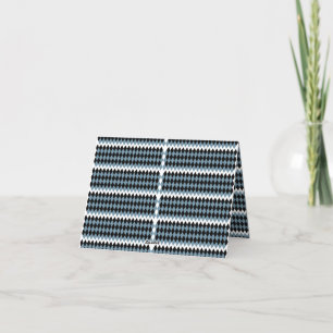 a black and white chequered pattern with a white b thank you card