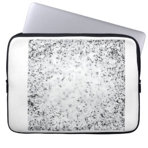 A black and white grainy texture background laptop sleeve