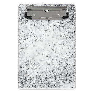 A black and white grainy texture background mini clipboard