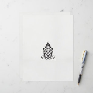 a black and white image of an ornate design