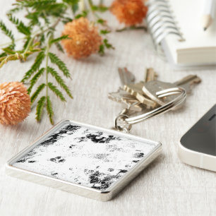 a black and white photo of a black and white photo key ring