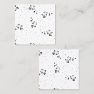a black and white photo of a bunch of dots calling card