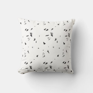 a black and white photo of a flock of birds cushion