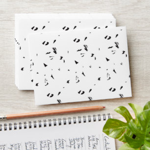 a black and white photo of a flock of birds envelope