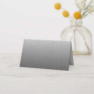 a black and white photo of a wall_ place card