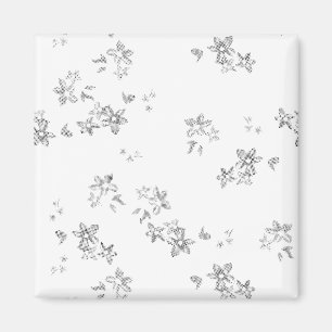 a black and white photo of a white background magnet