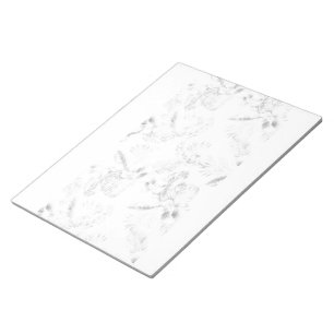 a black and white photo of a white background notepad