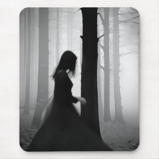 A black shadow brushes past the tree mouse mat (Front)