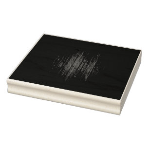a black wood texture background with a white strip rubber stamp