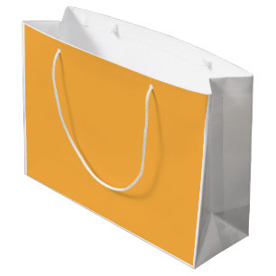 A blend of yellow and orange hues creates a vibran large gift bag
