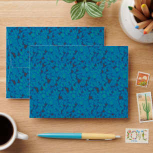 a blue and black background with a pattern envelope