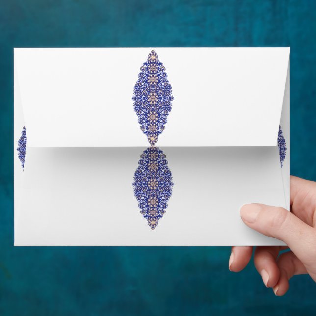 a blue and gold pattern on a white background envelope (Hand)