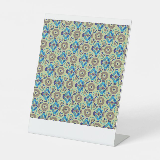a blue and green pattern on a green background pedestal sign (Front)