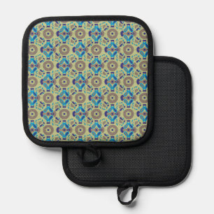 a blue and green pattern on a green background pot holder