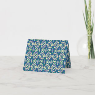 a blue and green pattern with a white background thank you card