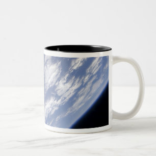 A blue and white part of Earth Two-Tone Coffee Mug