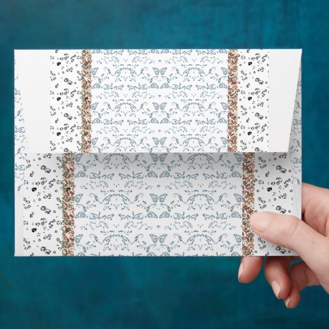 a blue and white wallpaper with a pattern on it envelope (Hand)