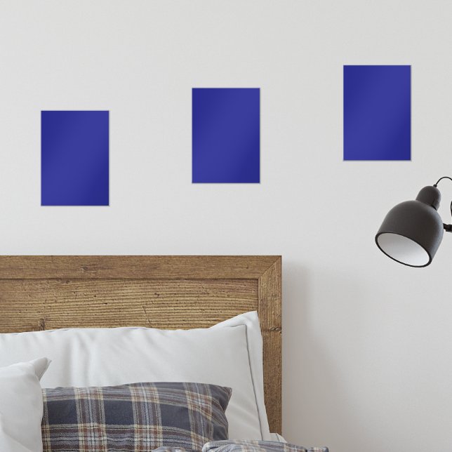 A blue background featuring a prominent white squa (Bedroom)