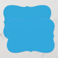 a blue background with a black and white cat