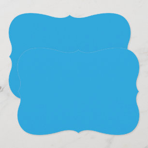 a blue background with a black and white cat card