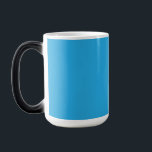 a blue background with a black and white cat magic mug<br><div class="desc">Explore the charming contrast of a black and white cat against a serene blue background. This captivating image captures the essence of a beloved pet on a unique backdrop."</div>