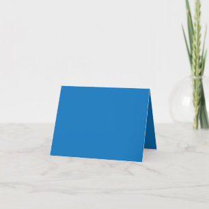 a blue background with a black and white clock thank you card