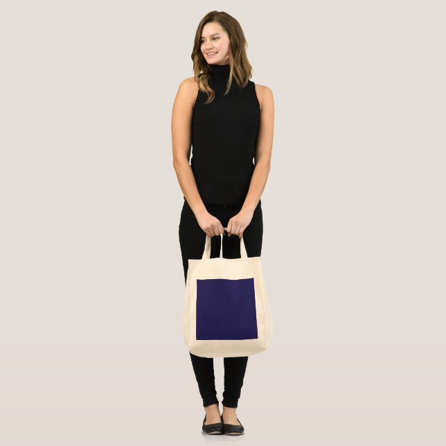 a blue background with a clock on it tote bag (Front (Model))