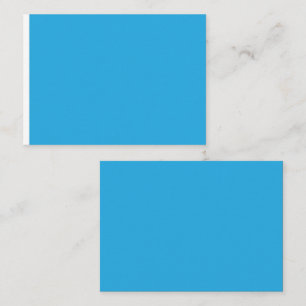 a blue background with a place card