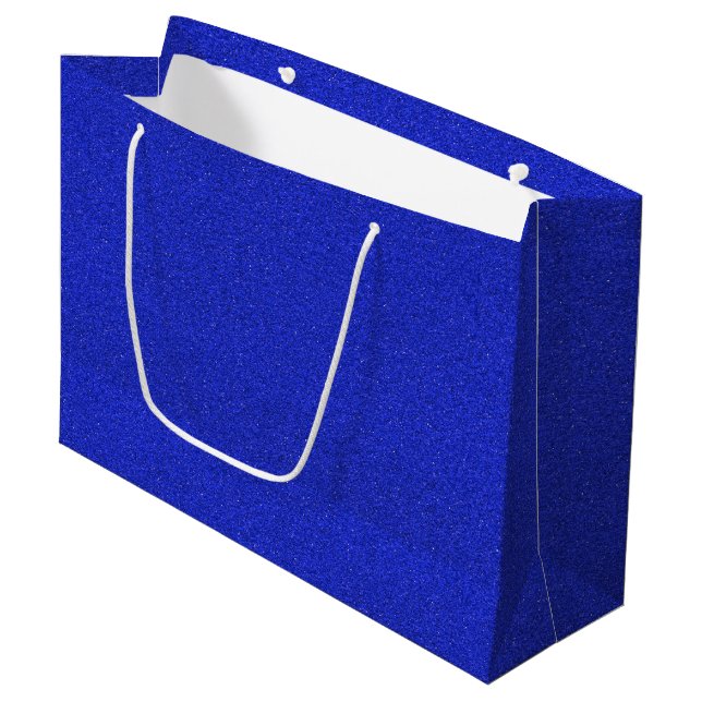 A blue glitter gift bag with white handles (Front Angled)