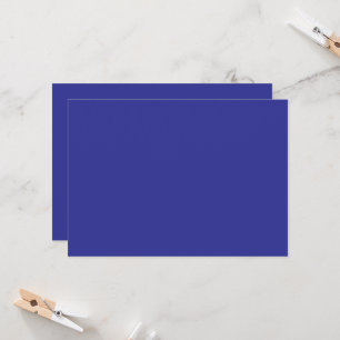 a blue wall with a clock invitation
