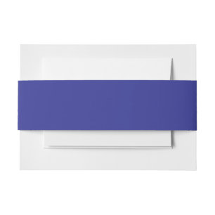 a blue wall with a clock  invitation belly band