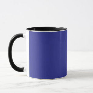 a blue wall with a clock on it mug