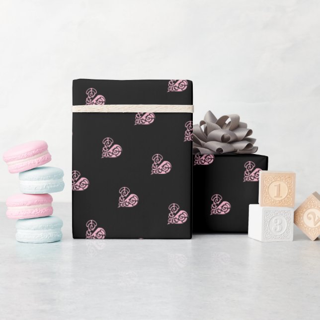 A bold black and pink filigree heart design wrapping paper (Baby Shower)