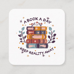 A book a day keep reality away square business card