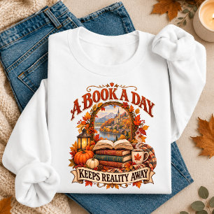 A Book A Day Keeps Reality Away Cosy Autumn Reader Sweatshirt