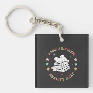 A Book A Day Keeps Reality Away Key Ring