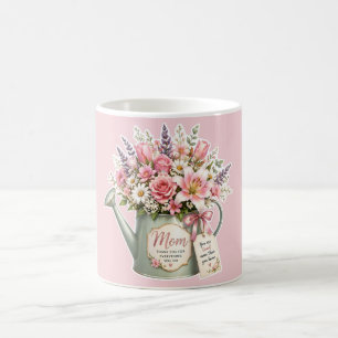 A bouquet of flowers in a watering can for mum  coffee mug