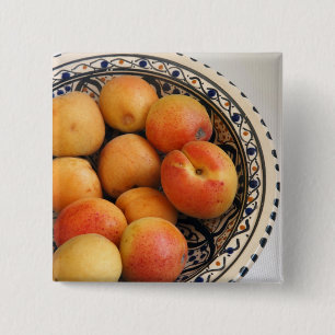 A bowl of Mediterranean Apricots 2 15 Cm Square Badge