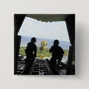 A box of humanitarian goods 15 cm square badge