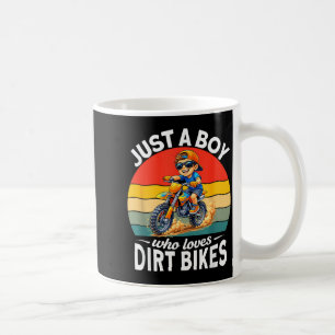 A boy who loves dirt bikes motocross enduro kids coffee mug