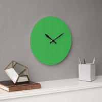 A bright green screen set against a clean white ba