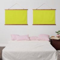 A bright yellow square with a distinct white borde