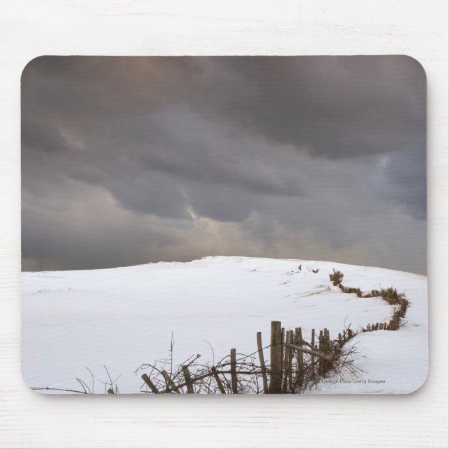 A Broken Fence Along A Snow Covered Field Mouse Mat (Front)